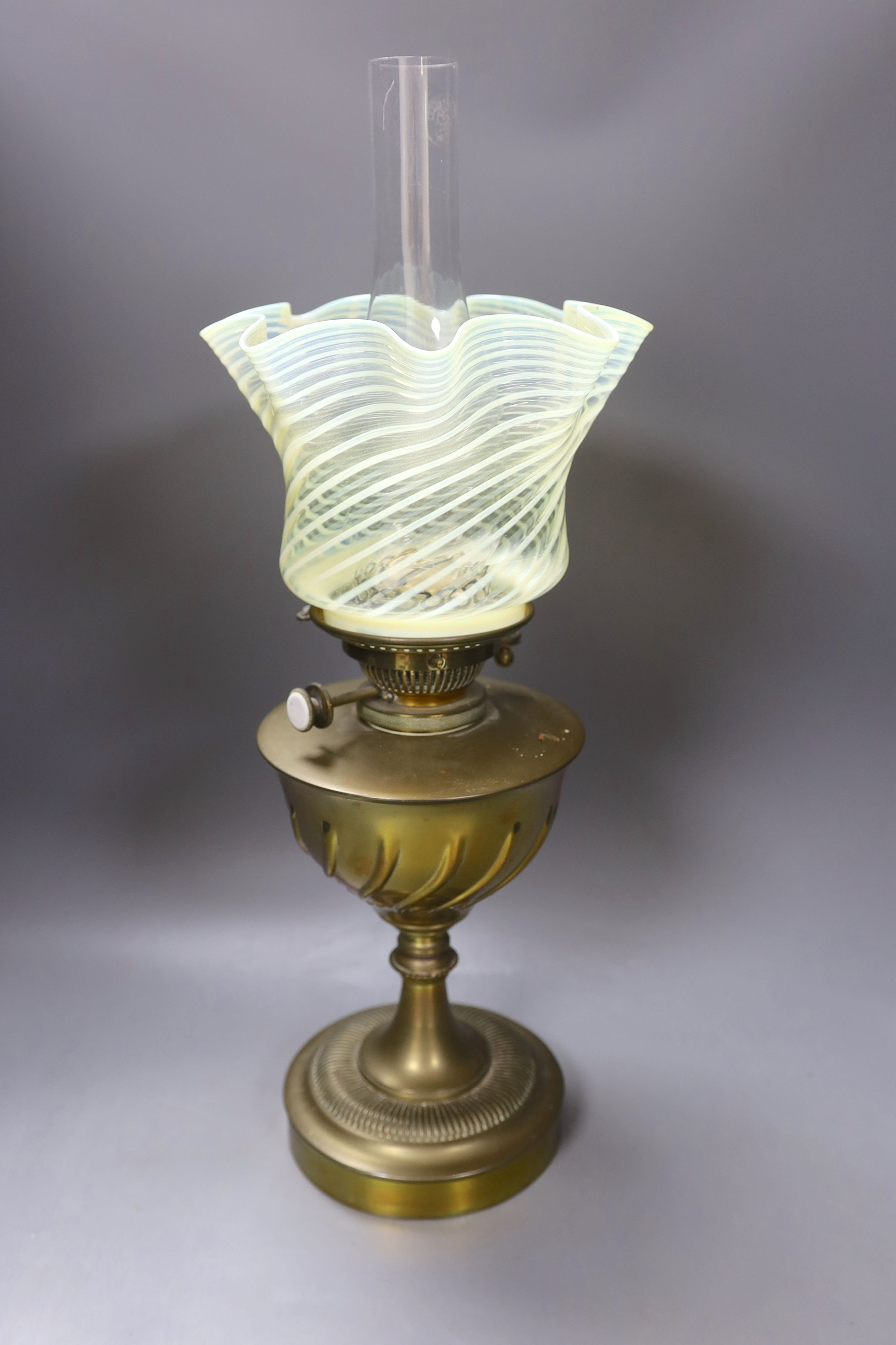 An oil lamp with vaseline glass shade - 56cm tall